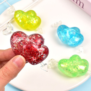 Juguete Blandito de Piruleta con Corazón Brillante, TPR Maltosa de Ascenso Lento, Juguete Antiestrés con Lentejuelas Transparentes para Alivio del Estrés y Descompresión - Product Image 4