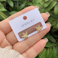 Boucles d'oreilles en forme de bague papillon à la mode cuivre plaqué or 18 carats intégré plein diamant Zircon nouveau Design dames tenue quotidienne cadeau