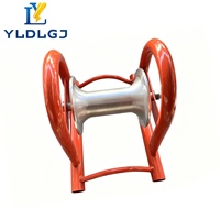 Rouleau de câble en aluminium Hourglass, cadre orange, avec boucles de transport, guides de soudure en acier usiné (supérieur et inférieur) pour le tirage et la pose d'infrastructure