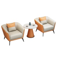 Canapé sectionnel moderne et simple en similicuir une place avec table de négociation et chaise assortie pour hall d'hôtel et centre commercial