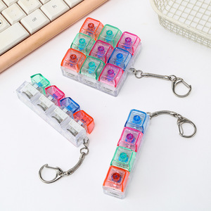 พวงกุญแจรูปทรงสี่เหลี่ยมพร้อมปุ่มกดคลายเครียด 9 ปุ่ม วัสดุ ABS เปลี่ยนสีได้ ของเล่นนิ้วมือ พร้อมห่วงสแตนเลส - Product Image 4