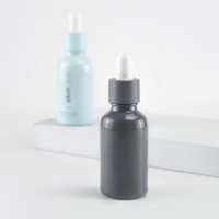 Nouvel emballage cosmétique conçu de bouteille en verre opale de cylindre de 30ml avec le chapeau de compte-gouttes pour l'emballage cosmétique