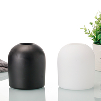 Diffuseur de parfum en verre élégant et personnalisable pour la maison, avec un design moderne et unique