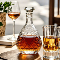 Bouteille de verre vide ronde personnalisée, épaissie, gravée et embossée, pour rhum, brandy, tequila, whisky, vin