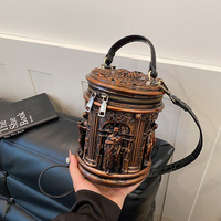 Sac à bandoulière rétro en cuir PU, forme cylindrique, avec sculpture gothique vintage unique et relief 3D en relief, style baril