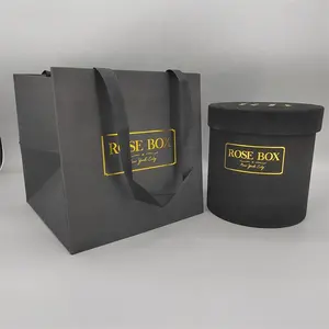 परफ्यूम और उपहार पैकेजिंग के लिए कस्टम लोगो लैमिनेटेड सामग्री के साथ कस्टम ब्लैक लक्ज़री फ्लावर बॉक्स और क्राफ्ट शिपिंग बैग
