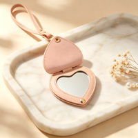 Porte-clés en cuir PU personnalisé en forme de cœur, miroir compact, mini miroir de maquillage de poche, finition argentée, vente en gros, cadeau