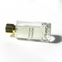 Flacon de parfum en verre transparent, cylindrique, plat et vide, 100 ml, avec atomiseur, flacon pompe pour lotion, emballage pour soins de la peau, flacon de parfum de luxe