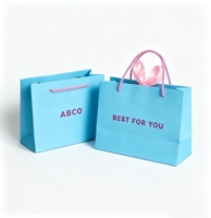 Sac de shopping en papier de luxe recyclable imprimé sur mesure à bas prix avec poignée en ruban et votre propre logo