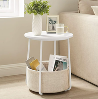 Table basse ronde contemporaine en bois Wayon noire avec panier de rangement amovible en tissu bleu pour salon