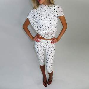 ชุดเซ็ตเสื้อครอปคอสูงลายจุดพร้อมกางเกงขายาวผ้าตาข่ายซีทรูสำหรับผู้หญิงจาก Voikerdr เหมาะสำหรับใส่ไปเที่ยวคลับ - Product Image 3