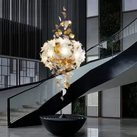 Lustre européen de luxe en cuivre et cristal avec un design de fleurs flottantes pour escalier, loft, plafond, ampoules LED