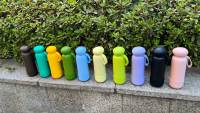 Venta caliente 32oz Frasco de camping con tapa Bota de silicona Vaso aislado de acero inoxidable con tapa