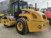 Rouleau compresseur vibrant à tambour unique CAT CS-683E d'occasion, compacteur Caterpillar pour la construction routière