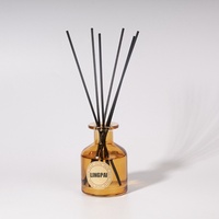 Diffuseur de parfum en verre ambré de luxe prêt à l'emploi de 100 ml avec un design unique pour la maison