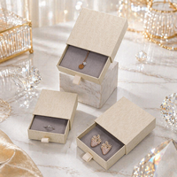 Boîte cadeau en papier magnétique noire personnalisée avec logo, emballage de bijoux, et boîte intérieure octogonale en velours, très populaire pour la vente en gros