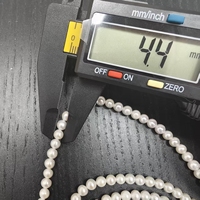 Collier en perles d'eau douce Camellia multi-positions - Design élégant et intemporel