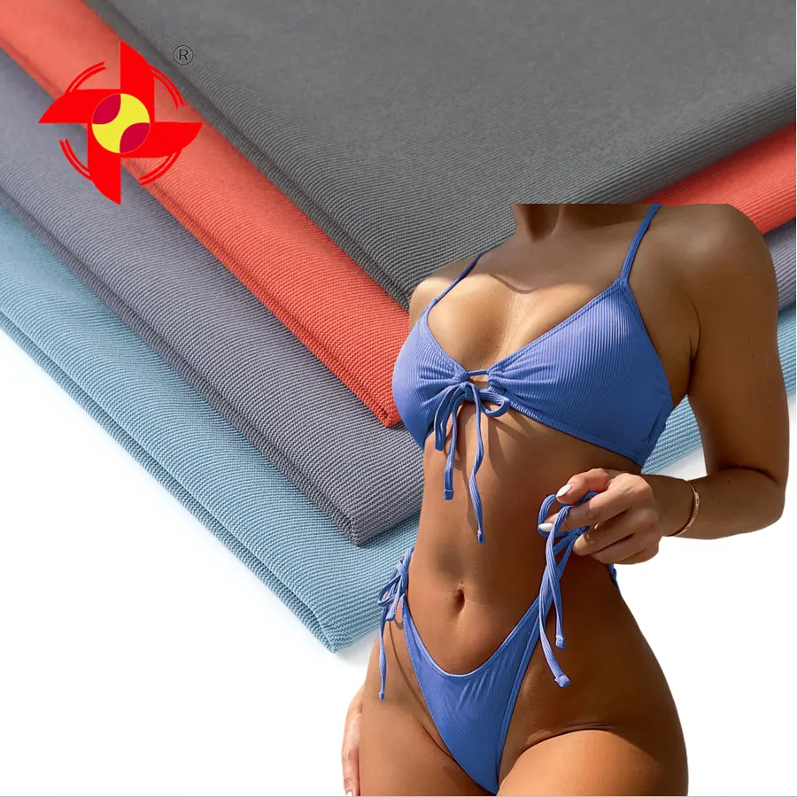 Penjualan paling laris 4 cara melar 82 nilon 18 spandex 170gsm kain rajutan kering cocok kain Lycra untuk mode wanita pakaian renang Bikini seksi