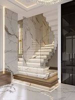 Escalier droit moderne Tanlong à double volée avec éclairage LED encastré, garde-corps en verre et acier inoxydable poli, marches en marbre