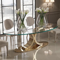 Ensemble de table à manger en marbre gris moderne avec pieds en acier inoxydable chromé pour hôtel ou villa avec chaise de salle à manger