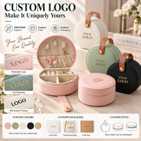 Étui de voyage rond en cuir PU avec logo personnalisé, poignée, support pour colliers, plateau à bagues, couleur personnalisée, vente en gros, boîte cadeau en vrac