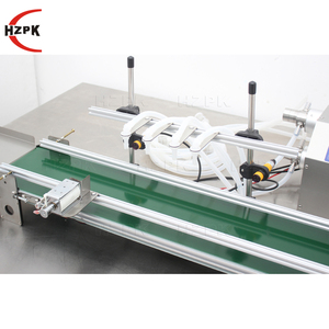 Machine de remplissage automatique HZPK à 4 têtes pour boissons, bouteilles en verre et bocaux de 500 ml, avec petite bande transporteuse - Product Image 5