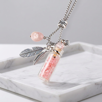 Nouveau Collier Pendentif Bouteille à Parfum en Acier Inoxydable avec Pierre Naturelle Quartz Rose et Cristal Créatif