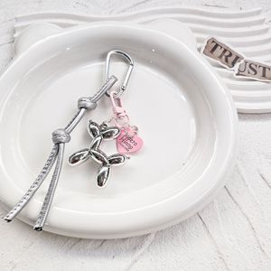 Goreal 2025 mới đến Phụ nữ túi chuỗi hợp thời trang Chic da bện bóng dễ thương bé nhỏ con chó Keychain túi quyến rũ - Product Image 2