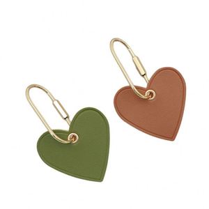 HR Wholesale PU Leather Embossed Heart Leather Keychain Modern <b>Key</b> <b>Rings</b> Personalised Saffiano Leather Heart Keyring for Gifts - Product Image 2