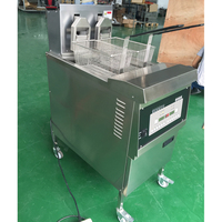 Haute productivité magasins d'alimentation huile de poulet filtrant les paniers de levage friteuse à gaz électrique commerciale