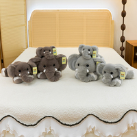 Vente en gros Grand éléphant couché en peluche, animal en peluche câlin, éléphant bébé pour la tête, idéal pour la chambre d'enfant et le canapé, cadeau