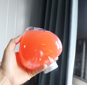 Botella de plástico <span class=keywords><strong>en</strong></span> forma de <span class=keywords><strong>amor</strong></span>, bebida, PET, botella de burbujas frías, leche, té, jugo, botella de bebida creativa - Product Image 4