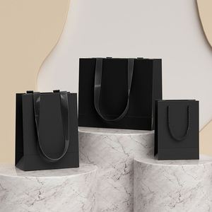 Bolsas de Compras Personalizadas con Logotipo de Marca de Ropa, de Alta Calidad, Duraderas, Impresas, con Asas de Cuerda de Algodón Kraft, Reciclables - Product Image 1