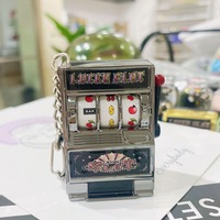 Nouvelle Machine à sous d'arcade miniature de luxe, jouet de casino pour enfant, portable, thème anime dessin animé 3D, jeu de hasard aux fruits, porte-clés, vente en gros