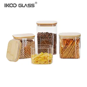 Tarro de almacenamiento de alimentos de vidrio de diseño personalizado IKOO personalizado con tapa de madera de bambú
