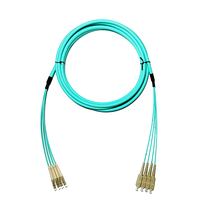 LSZH bahan 5.0mm Diameter luar lapis baja multifode 4-core 10G serat optik Jumper LC/SC/FC/ST