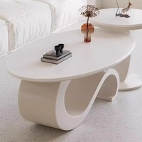 Table basse ovale moderne de luxe léger avec plateau en pierre, design simple et minimaliste pour salon et chambre à coucher – Nouveaux essentiels pour la maison