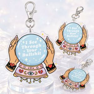 Porte-clés humoristique pour la vente en gros : « Je vois traverser votre connerie » avec breloque boule de cristal, en vrac - Product Image 2