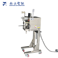 Machine d'insertion de sac déshydratant NY-857 pour la ligne de production de codage d'étiquetage de capsulage de cachetage de remplissage de tasse de bouteille