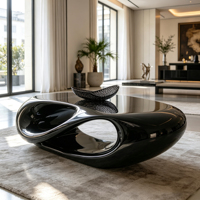 Table basse ovale sculpturale en fibre de verre noire brillante, design monobloc pour espace de vie résidentiel moderne et luxueux