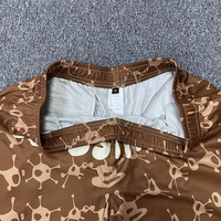 Short de sport imprimé par sublimation personnalisé en gros Short de basket-ball en maille de polyester respirant pour hommes