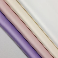Tissus en viscose, polyester, satin brillant, charmeuse, imitation soie, satin extensible, crêpe, acétate