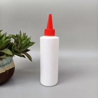 Fabrication Bouteille d'emballage d'huile à cheveux ronde personnalisée en PEHD de 60ml Bouteille à presser avec bouchon à embout de 100ml Bouteilles en plastique de 150ml