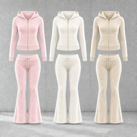 Nouveautés 2026 : Ensemble 2 pièces pour femme, comprenant un crop top en tissu éponge et un pantalon, en coton et élasthanne, coupe ajustée, style survêtement à capuche.