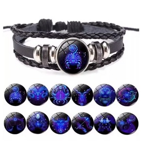 Bracelet avec pendentif des 12 signes du zodiaque, bracelet en cuir tissé à la main pour hommes et femmes - Product Image 1