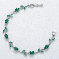 Bracelet unisexe tendance en forme de feuilles torsadées plaqué or avec zircon, idéal pour la vente en gros