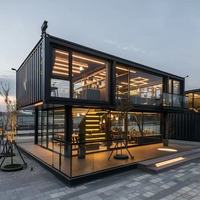 Maison modulaire préfabriquée en conteneurs, intérieur et extérieur personnalisés, résistante au vent et au feu, pour chantier de construction