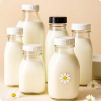 Bouteilles en verre carrées transparentes de 250 ml, 350 ml, 500 ml, 1000 ml, 8 oz avec bouchon à vis hermétique pour jus pressé à froid