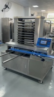 Machine d'alignement automatique de plateaux, arrangeur de plateaux automatique commercial pour la ligne de production de pâtisserie, de gâteaux et de biscuits