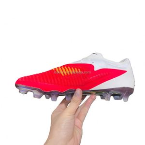 Botas de fútbol FG/TF al por mayor OEM/ODM para adultos y jóvenes, con opciones antideslizantes, ligeras y transpirables de tejido. - Product Image 3